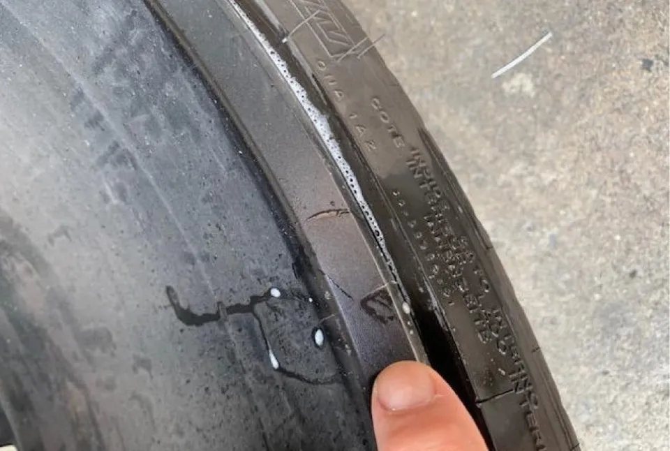 Close-up of crack in C7 Corvette cast aluminum wheel