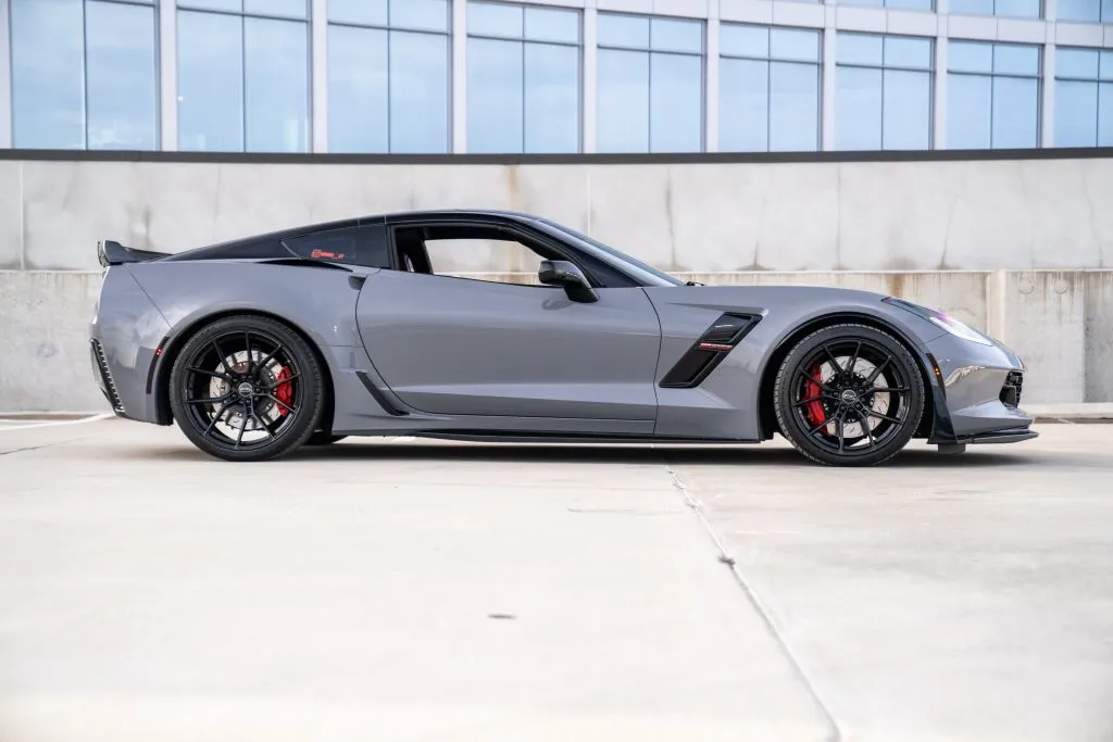 Gray C7 Corvette showcasing E5 custom wheels from the side